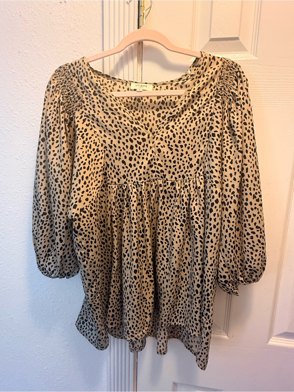 Umgee Beige and Black Leopard Print V-Neck Babydoll Blouse